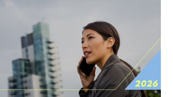 Woman on phone near modern building